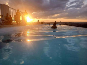 Swimming pool with king bed, lifts and a gym